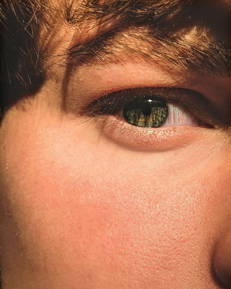 An eye in low warm light